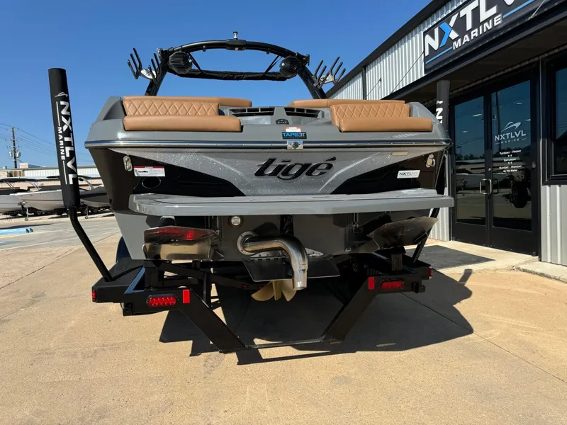 Slide: The Image of 2024 Tigé Z3 boat at NXT LVL Marine dealership, rear view. - 5