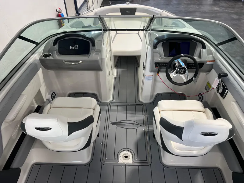 Slide: The Image of Interior of 2025 Chaparral 21 SSi boat with modern seating and dashboard. - 4