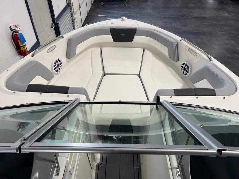 Slide: The Image of 2025 Chaparral 21 SSi boat interior with spacious seating and modern design. - 7