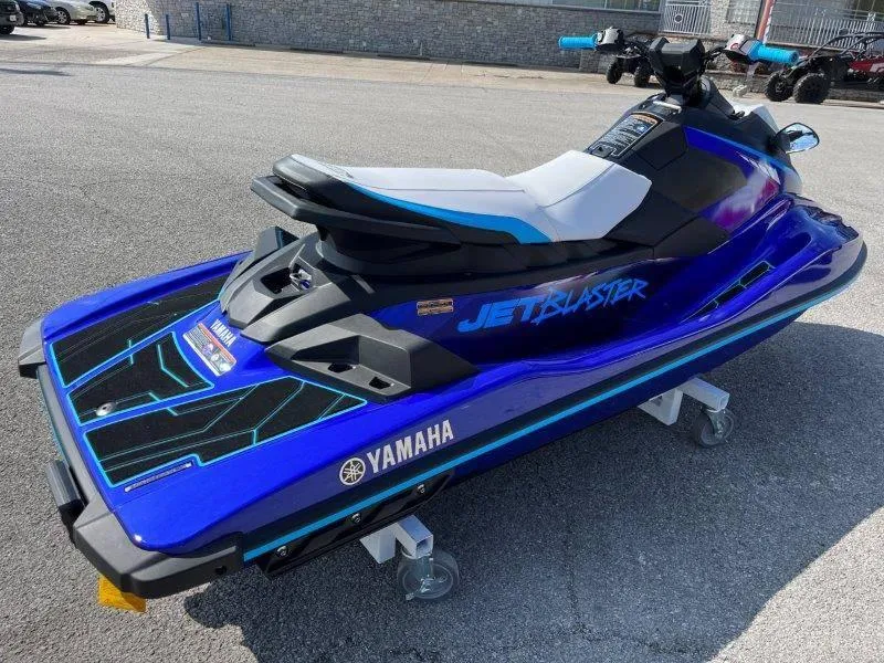 Slide: The Image of 2024 Yamaha Waverunner Jet Blaster in blue, parked on pavement. - 10
