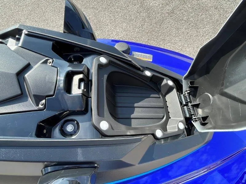 Slide: The Image of 2024 Yamaha Waverunner Jet Blaster storage compartment open, showcasing interior design. - 15