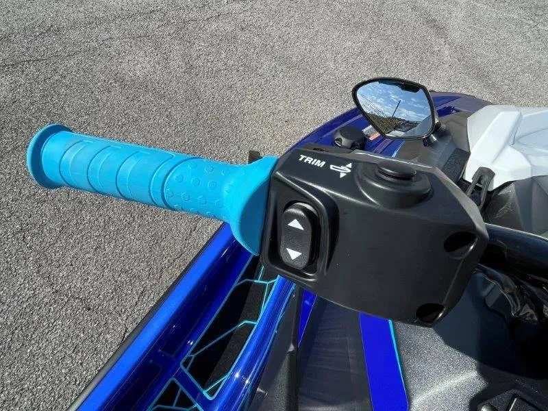 Slide: The Image of 2024 Yamaha Waverunner Jet Blaster handlebar with blue grip and trim controls. - 30