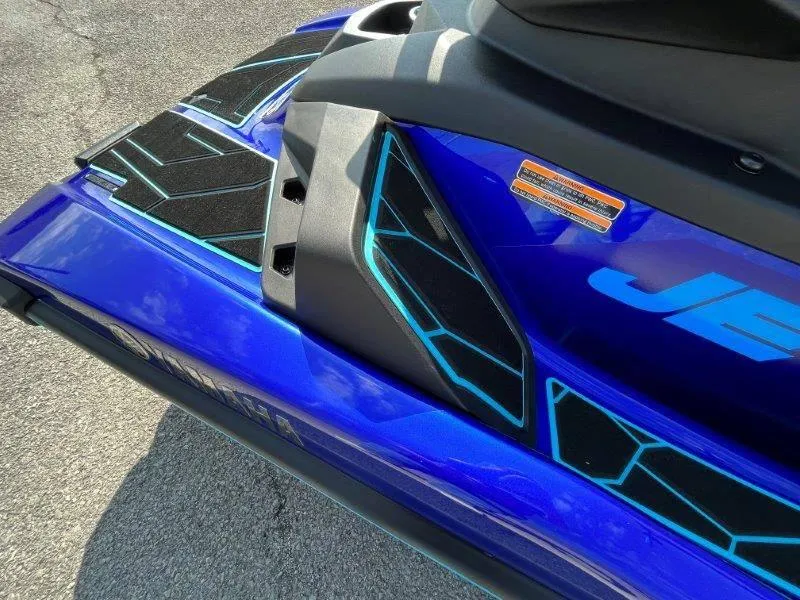 Slide: The Image of 2024 Yamaha Waverunner Jet Blaster, blue with black accents, close-up view. - 31