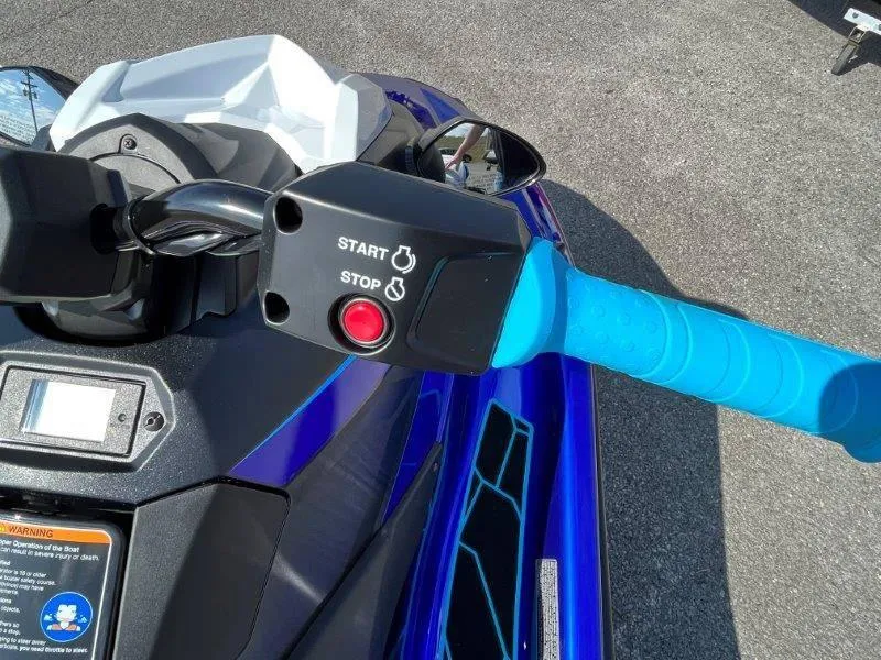 Slide: The Image of 2024 Yamaha Waverunner Jet Blaster handlebar with start/stop button, blue grip. - 33