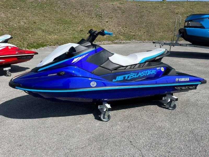 Slide: The Image of 2024 Yamaha Waverunner Jet Blaster in blue, parked on pavement. - 4