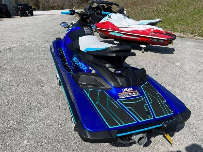 Slide: The Image of 2024 Yamaha Waverunner Jet Blaster in blue, parked on pavement. - 6