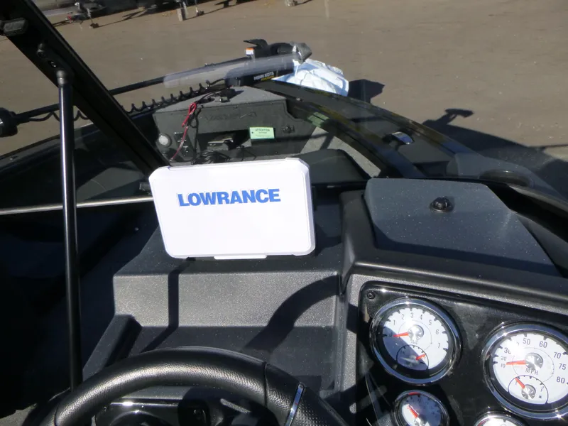 Slide: The Image of 2025 Tracker Targa V-18 Combo dashboard with Lowrance navigation system. - 26