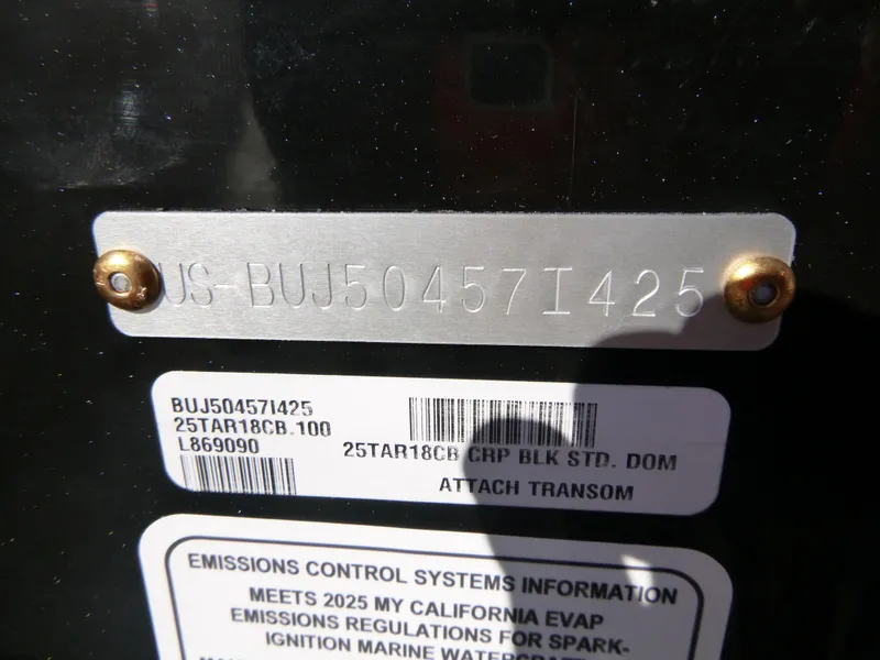 Slide: The Image of 2025 Tracker Targa V-18 Combo serial and emissions information plate. - 30