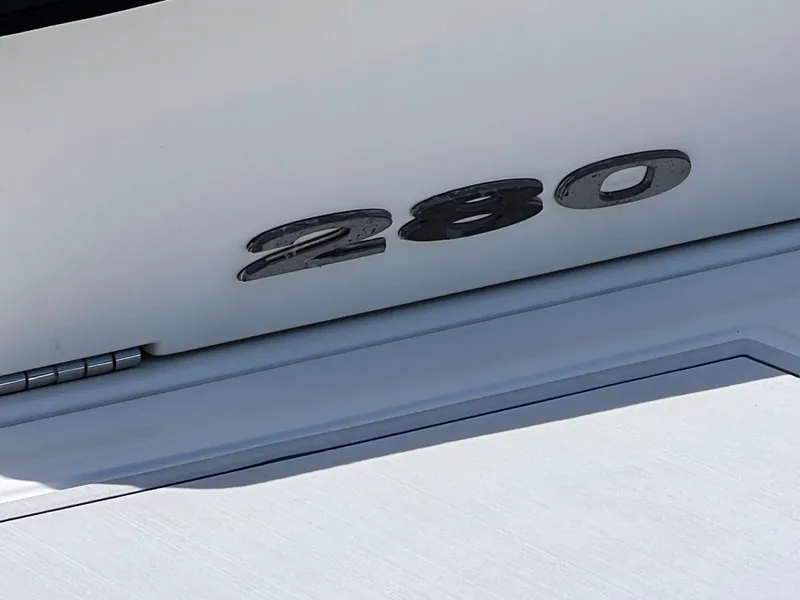 Slide: The Image of 2012 Sea Ray 280 Sundeck boat model number detail. - 15