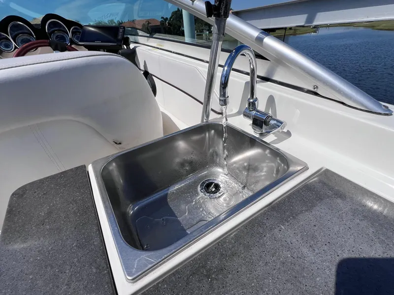 Slide: The Image of Stainless steel sink on 2012 Sea Ray 280 Sundeck boat with running water. - 32