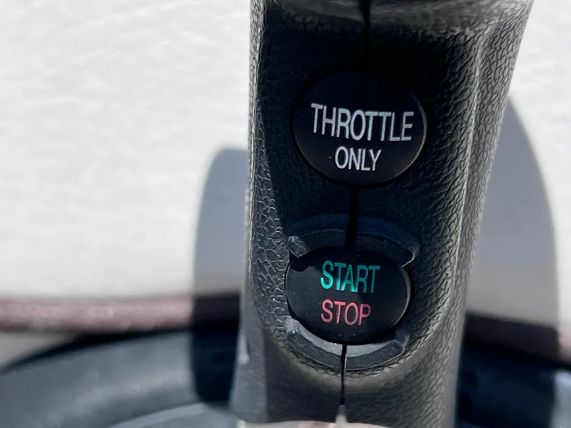 Slide: The Image of Throttle control with start/stop buttons on 2012 Sea Ray 280 Sundeck boat. - 40
