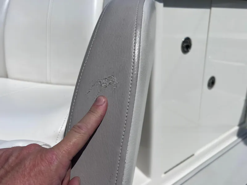 Slide: The Image of Close-up of damaged seat on 2012 Sea Ray 280 Sundeck boat. - 41