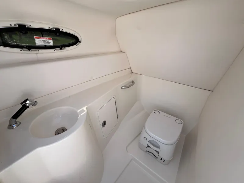 Slide: The Image of 2012 Sea Ray 280 Sundeck boat bathroom with sink and toilet. - 46
