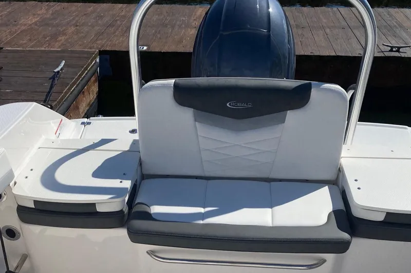 Slide: The Image of 2023 Robalo R207 Dual Console boat seating with sleek design and modern features. - 6