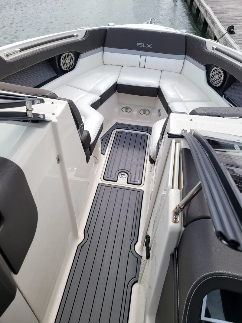 Slide: The Image of 2016 Sea Ray 280 SLX boat interior with sleek seating and modern design. - 16