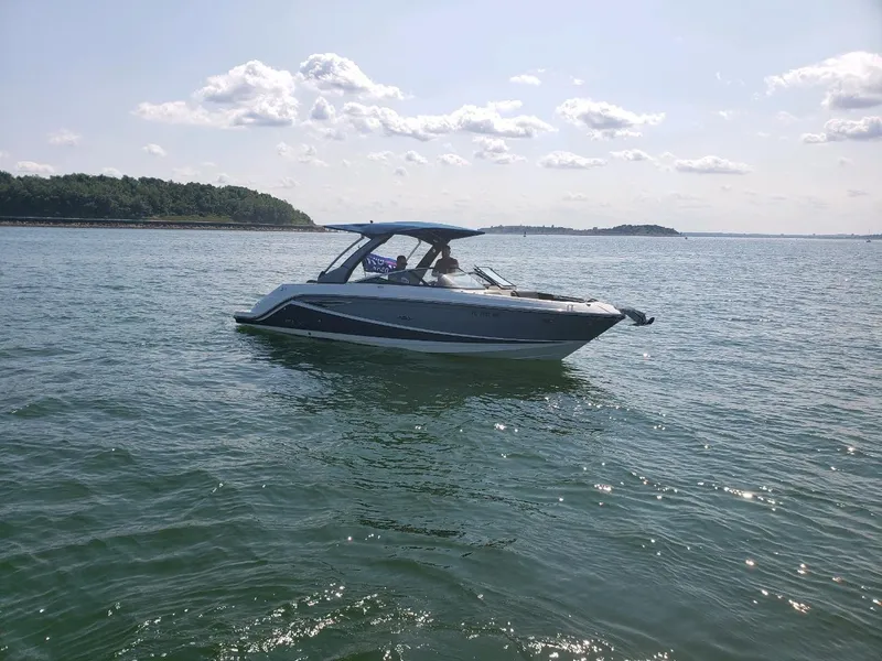 Slide: The Image of 2016 Sea Ray 280 SLX boat cruising on a sunny day. - 36