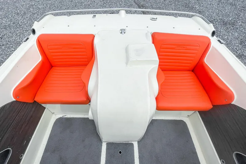 Slide: The Image of 1975 AristoCraft 19 boat interior with vibrant orange seating and white console. - 26