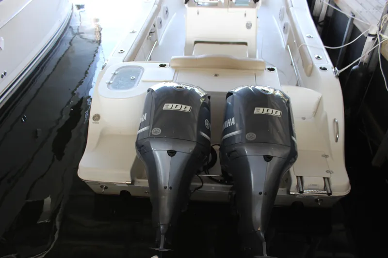 Slide: The Image of 2018 NauticStar 28 XS Offshore boat with twin Yamaha 300 engines. - 4