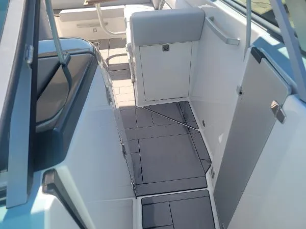 Slide: The Image of 2022 Aviara AV32 OB boat interior with sleek seating and modern design. - 27