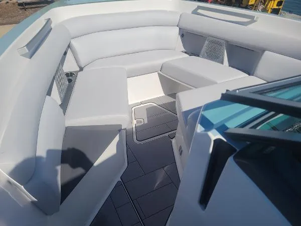 Slide: The Image of 2022 Aviara AV32 OB boat interior with sleek gray seating and modern design. - 29