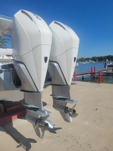 Slide: The Image of 2022 Aviara AV32 OB outboard motors by the waterfront. - 38