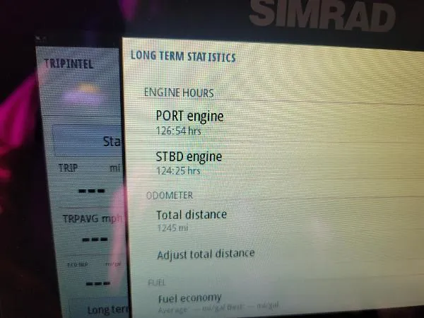 Slide: The Image of Simrad display showing engine hours and odometer for 2022 Aviara AV32 OB. - 40