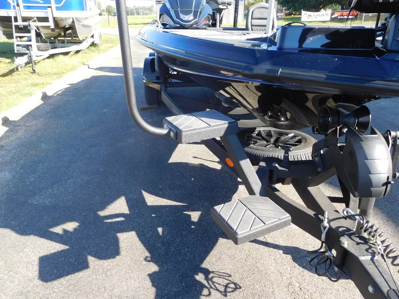 Slide: The Image of 2024 Vexus VXS 20 boat trailer with steps and black finish. - 10