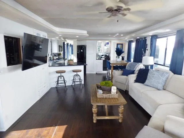 Slide: The Image of Luxurious 1997 Sumerset 16x80 houseboat interior with modern decor and spacious living area. - 2