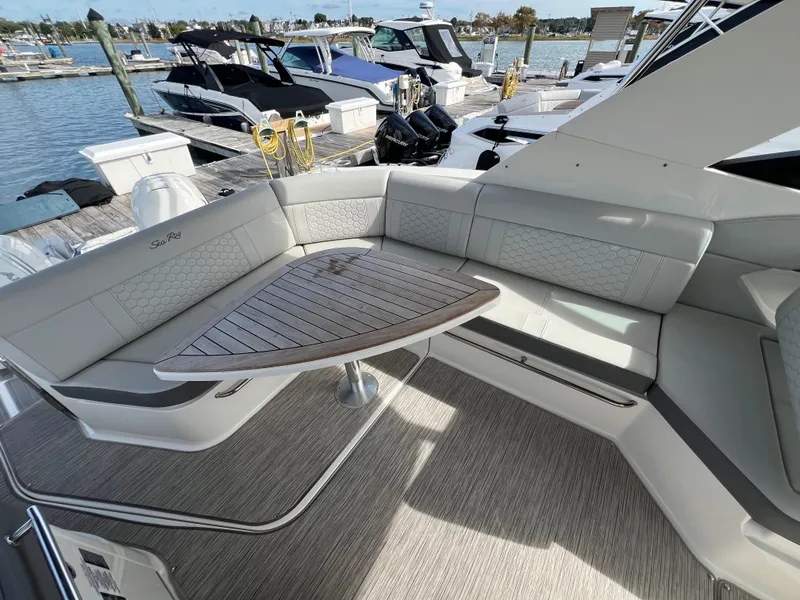 Slide: The Image of Luxurious seating area on 2022 Sea Ray Sundancer 320 OB yacht at marina. - 16