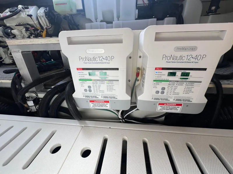 Slide: The Image of ProNautic 12-40P chargers in 2022 Sea Ray Sundancer 320 OB engine room. - 27