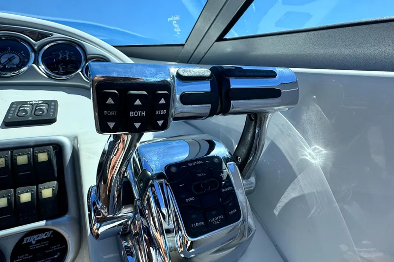 Slide: The Image of Close-up of 2008 Crownline 300 LS boat controls and dashboard. - 25
