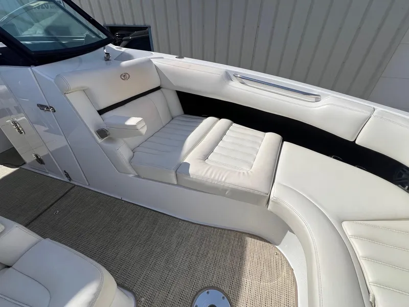 Slide: The Image of Luxurious seating on 2016 Cobalt R30 boat with white upholstery and sleek design. - 14