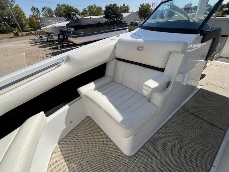 Slide: The Image of 2016 Cobalt R30 boat interior with white seating and armrest. - 15