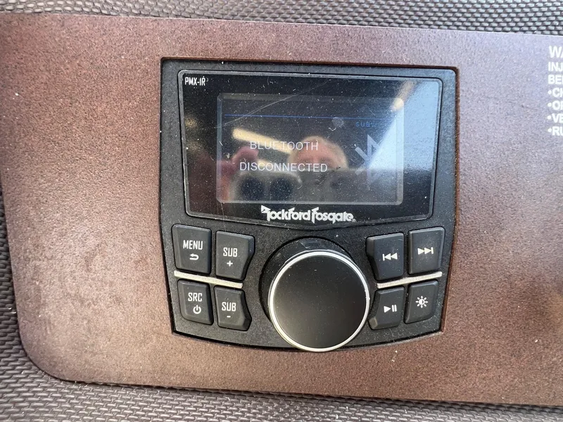 Slide: The Image of Rockford Fosgate PMX-1R audio system displaying "Bluetooth Disconnected" in a 2016 Cobalt R30. - 20