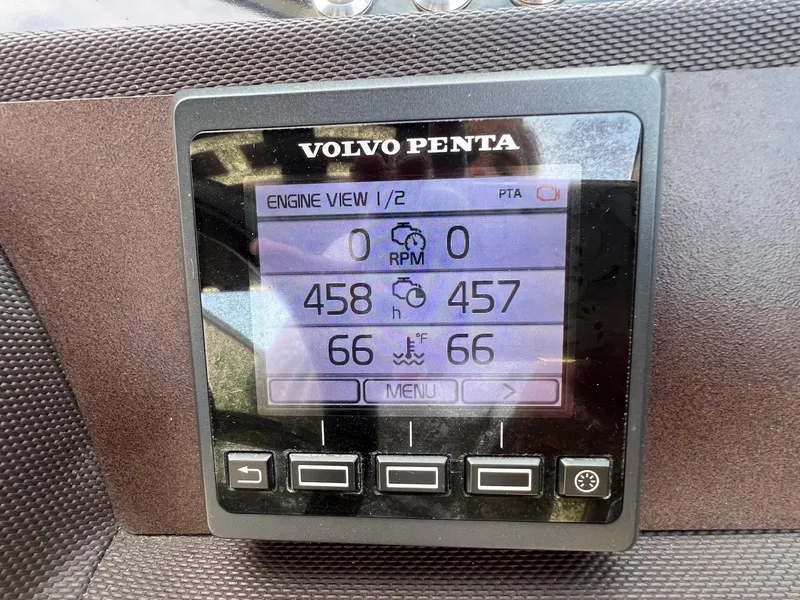 Slide: The Image of Volvo Penta engine display on 2016 Cobalt R30 boat, showing RPM and temperature. - 21