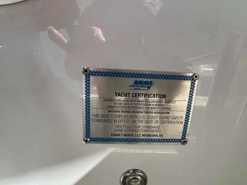 Slide: The Image of Yacht certification plaque on 2016 Cobalt R30, NMMA certified, U.S. Coast Guard compliant. - 27