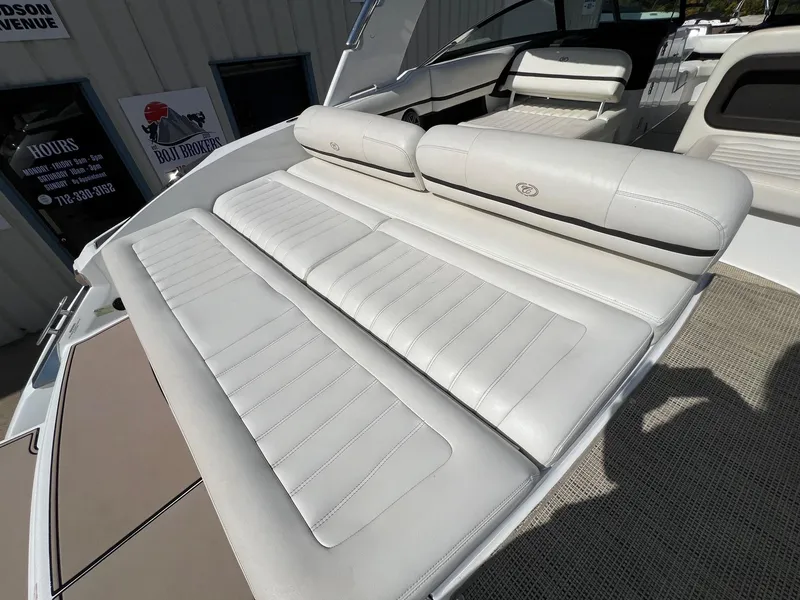 Slide: The Image of 2016 Cobalt R30 boat with white leather seating and modern interior design. - 37