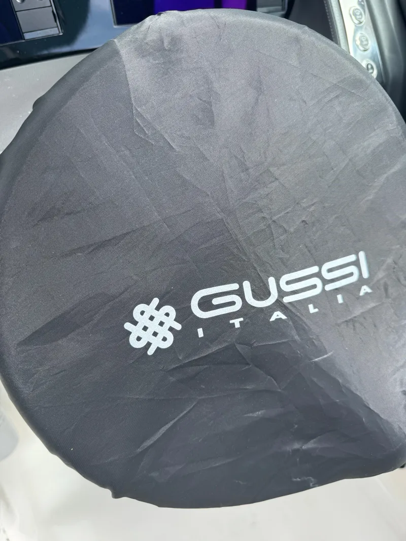 Slide: The Image of Steering wheel cover with Gussi Italia logo on Chaparral 267 SSX OB, 2022 model. - 11