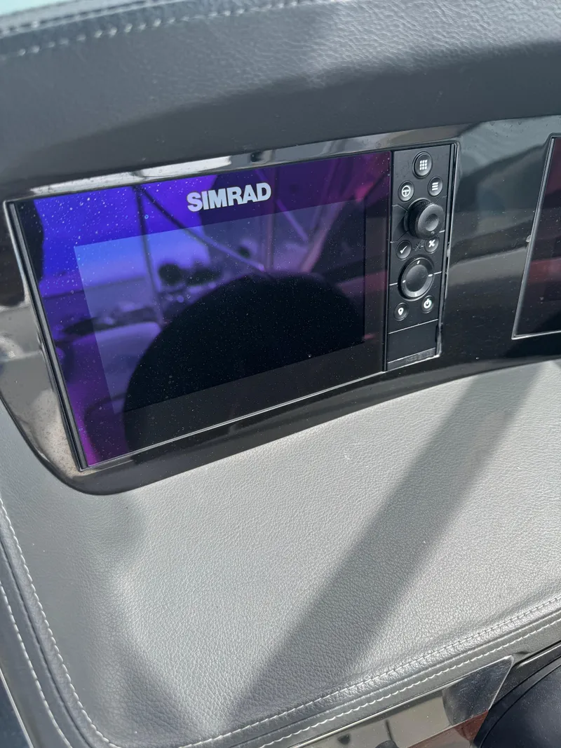 Slide: The Image of Simrad display on 2022 Chaparral 267 SSX OB boat dashboard. - 13