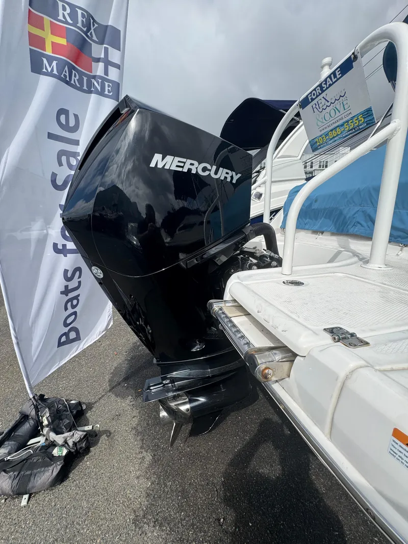 Slide: The Image of 2022 Chaparral 267 SSX OB with Mercury outboard engine, displayed for sale at Rex Marine. - 3
