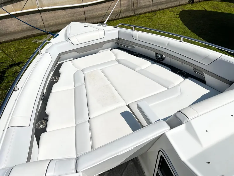 Slide: The Image of 2018 Formula 330 CRB boat with spacious white seating area. - 15