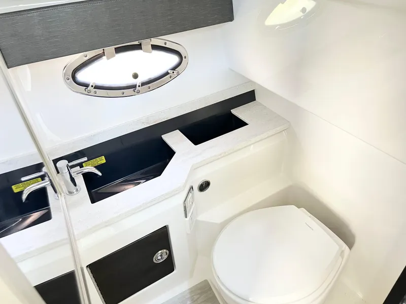 Slide: The Image of 2018 Formula 330 CRB boat bathroom with modern sink and toilet. - 20