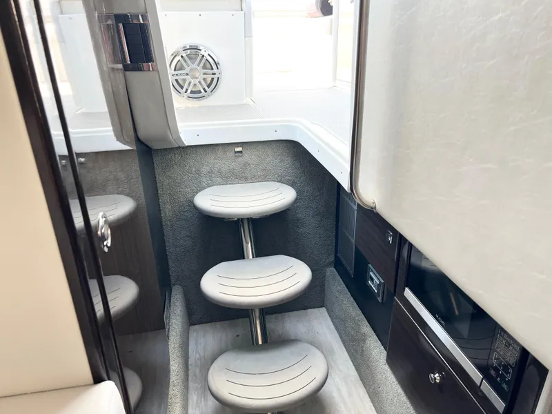 Slide: The Image of Interior of 2018 Formula 330 CRB boat with modern steps and sleek design. - 21