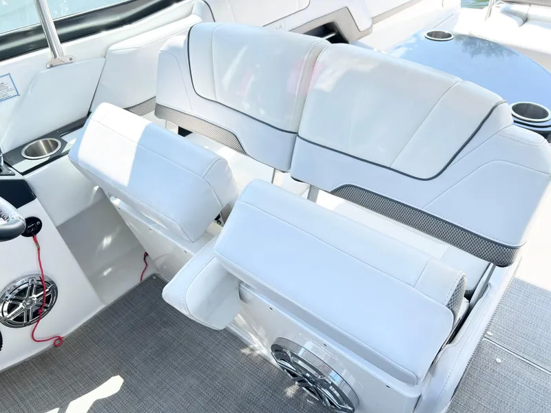 Slide: The Image of 2018 Formula 330 CRB boat interior with white seating and modern design. - 23