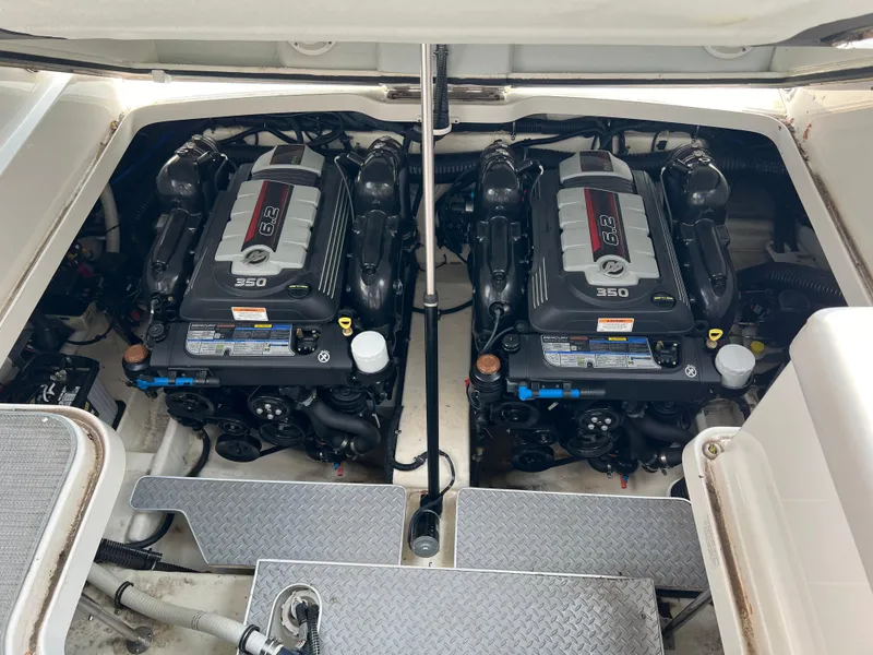 Slide: The Image of Twin engines in a 2018 Formula 330 CRB boat, showcasing powerful 350 horsepower each. - 4