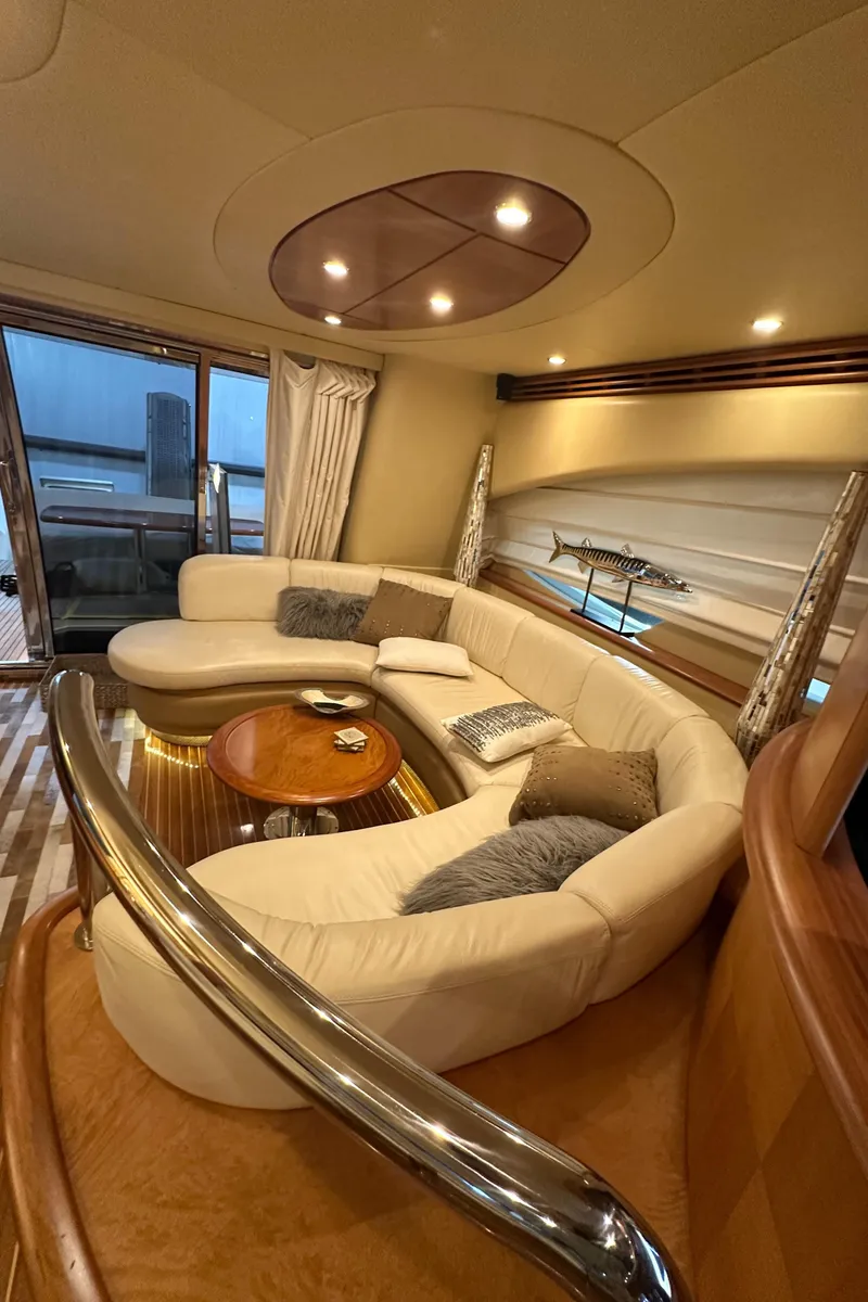 Slide: The Image of Luxurious interior of 2011 Azimut 62E yacht with elegant seating and modern design. - 19