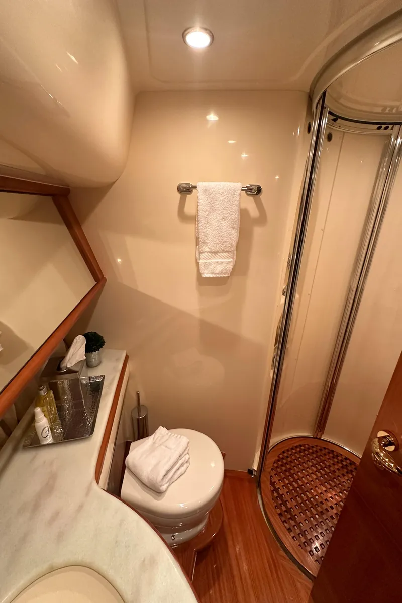 Slide: The Image of Luxurious bathroom in 2011 Azimut 62E yacht with shower, toilet, and elegant fixtures. - 36