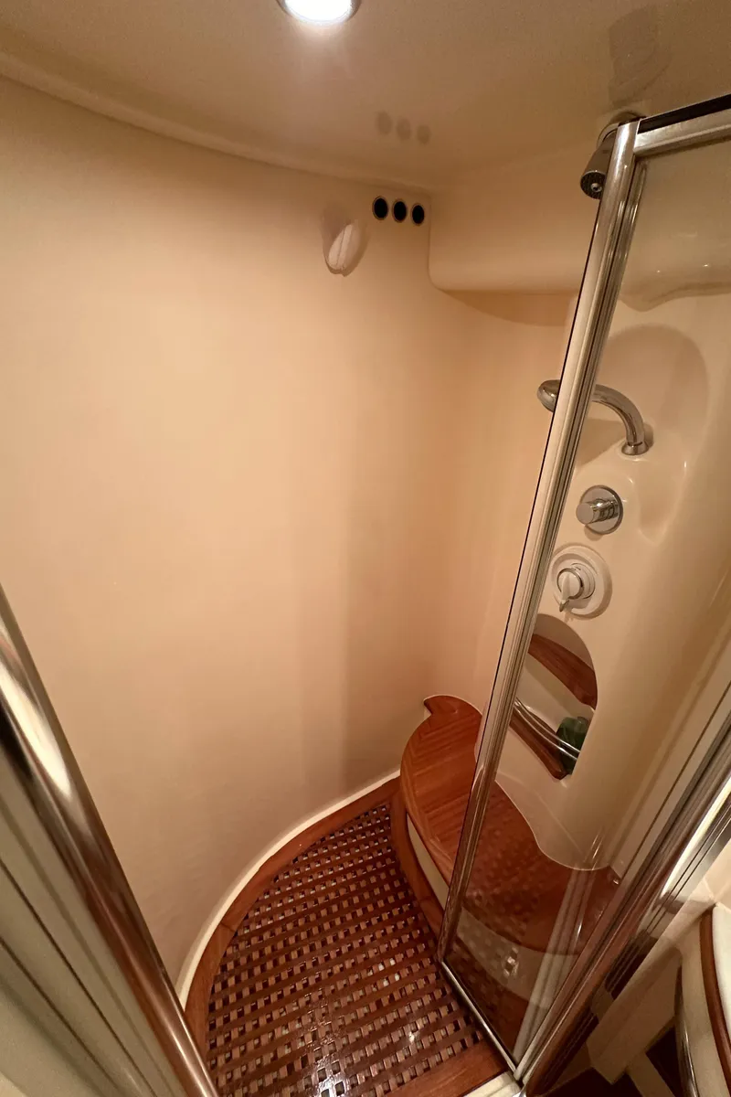 Slide: The Image of Shower area in 2011 Azimut 62E yacht with wooden flooring and glass door. - 46