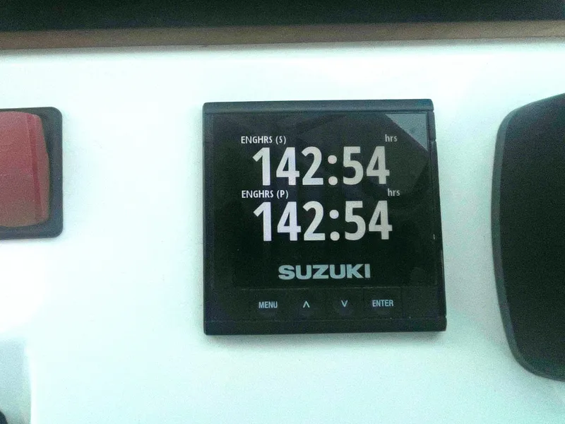 Slide: The Image of Only 142 hrs on twin Susuki 350 Duoprops - 15