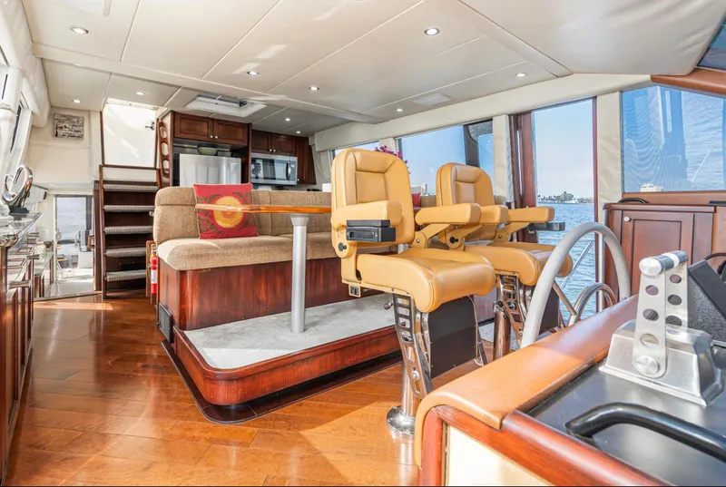 Slide: The Image of Luxurious interior of a 1998 Pacific Mariner 65 Motoryacht with plush seating and modern amenities. - 38
